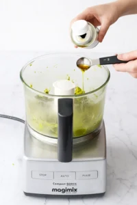 Adding oil to food processor during pistachio butter recipe