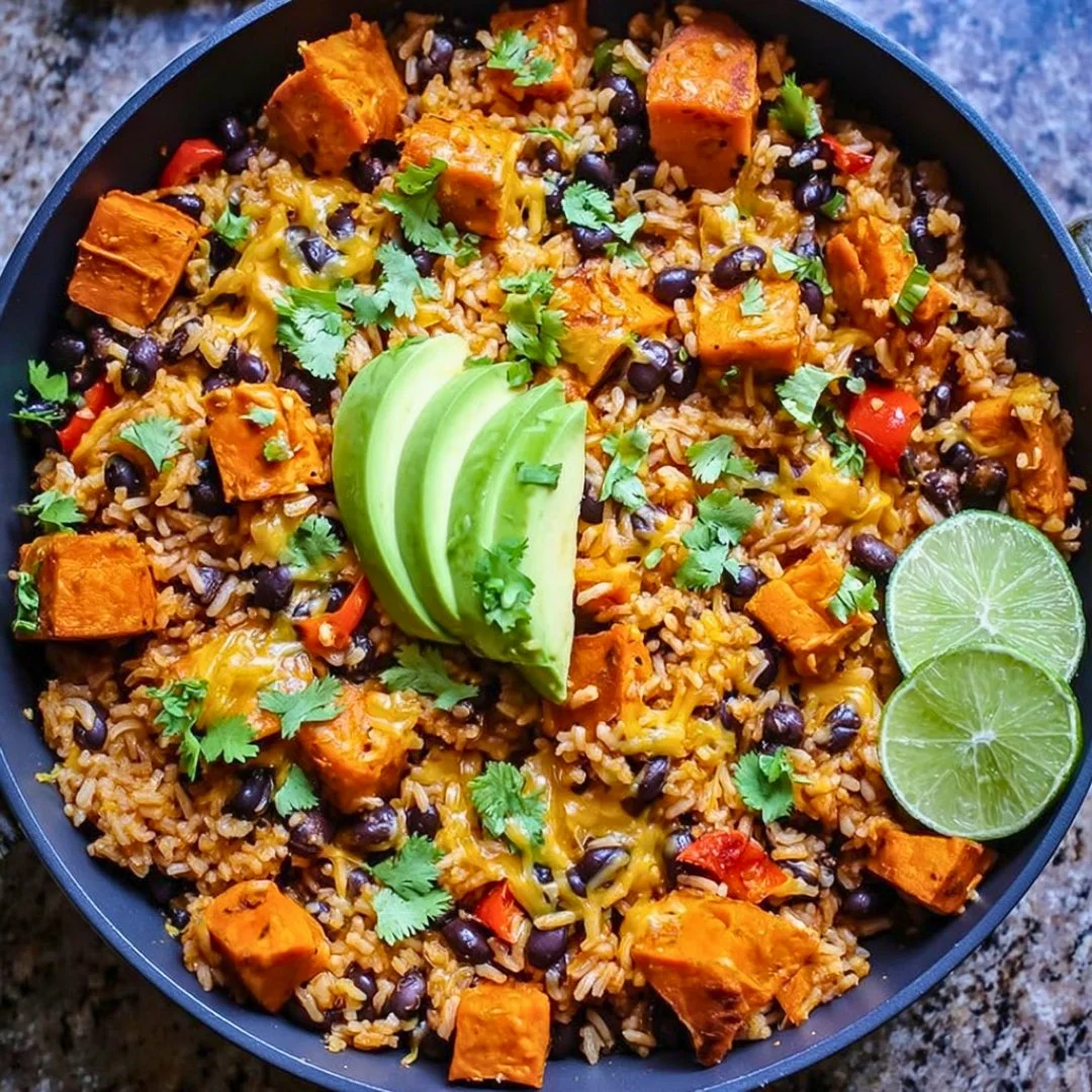Colorful Southwest sweet potato skillet with black beans and rice served in a pan
