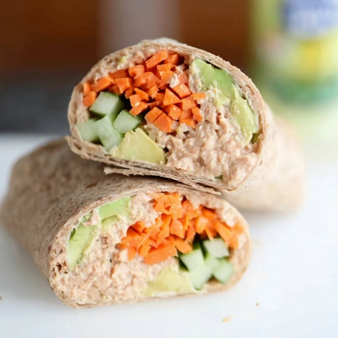 Blue_Salt_Trick_for_Men_Recipe_05 A bright, fizzy blue beverage with granulated salt crystals and a clear jar on a granite surface.