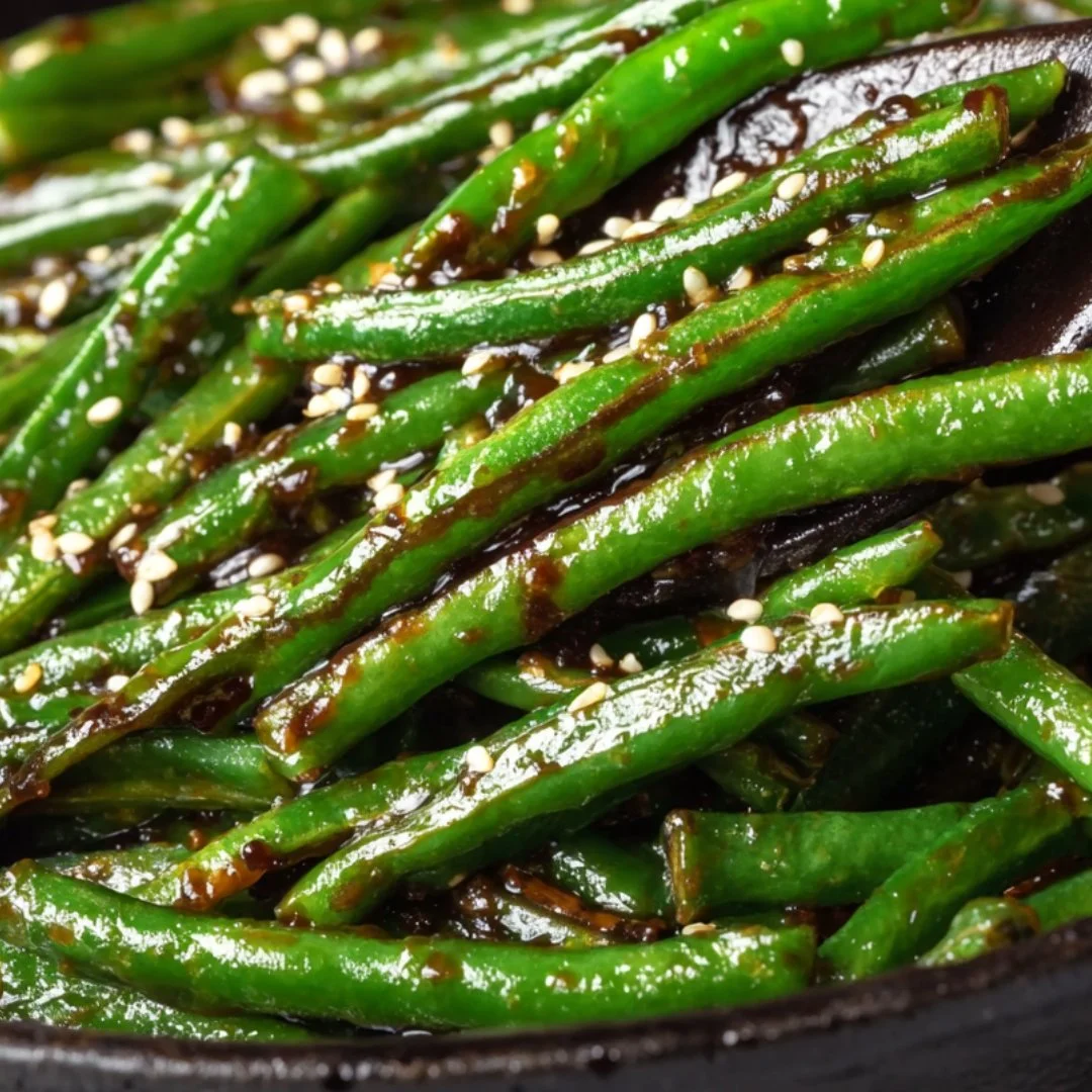 Plate of sautéed Chinese green beans with garlic and spices